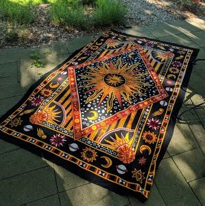 Celestial sun and moon tapestry